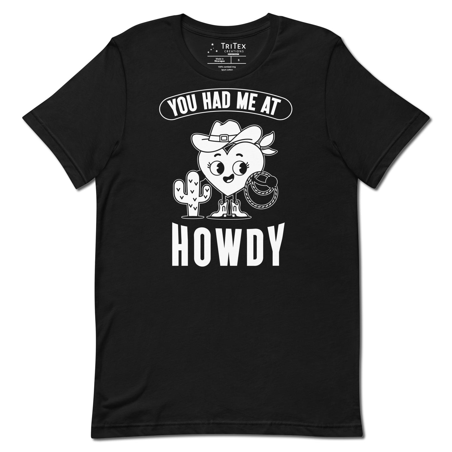 A black t-shirt featuring a cartoon heart dressed like a cowboy with the words "You has me at howdy".