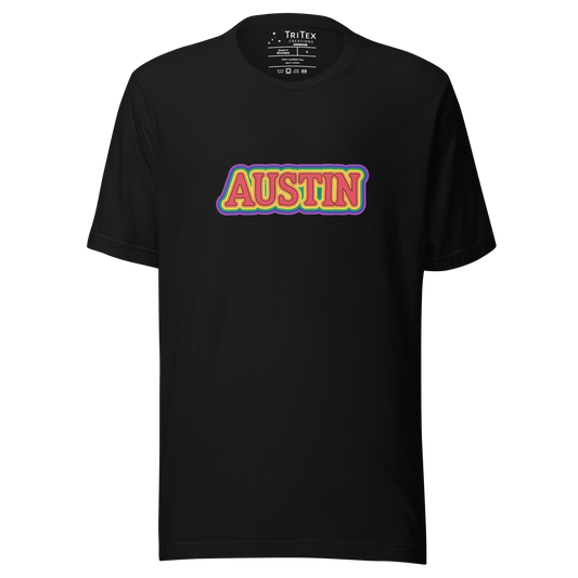A black t-shirt featuring the words Austin in rainbow colors.
