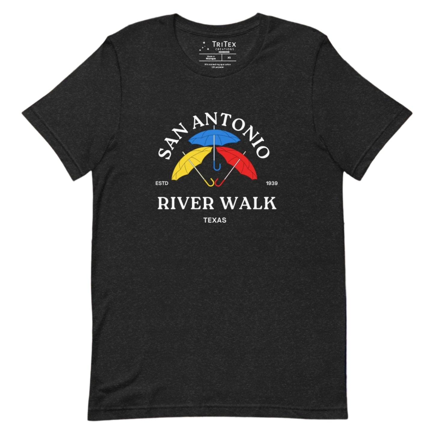 A black heather t-shirt featuring yellow, red, blue umbrellas and the text "San Antonio River Walk Texas. Estd. 1939".