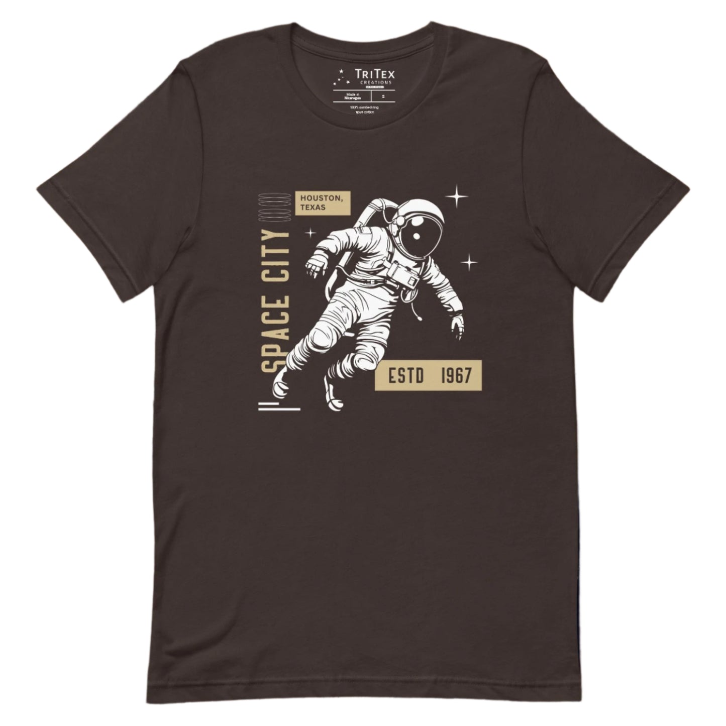 A brown t-shirt featuring an astronaut with the words "Space City. Houston, Texas. Estd. 1967".