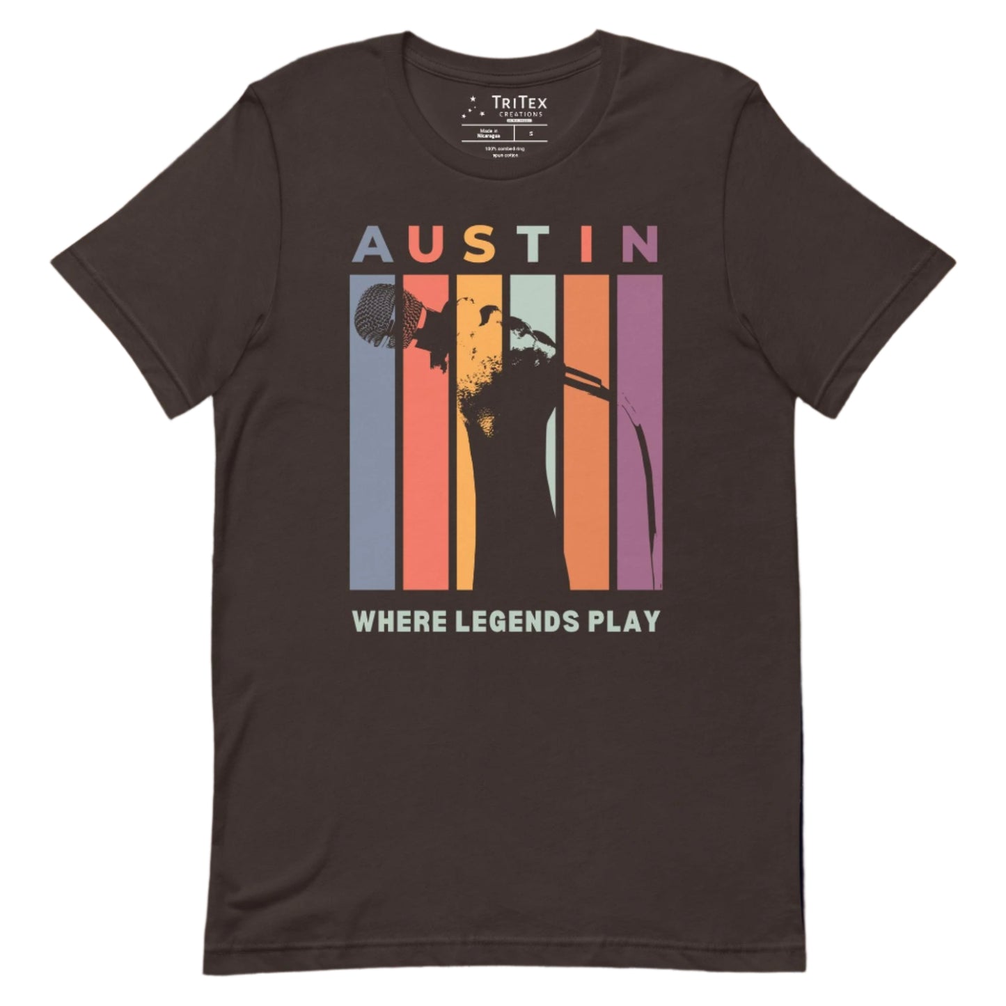 A brown t-shirt featuring a silhouette of a hand holding a microphone with the words "Austin. Where legends play".