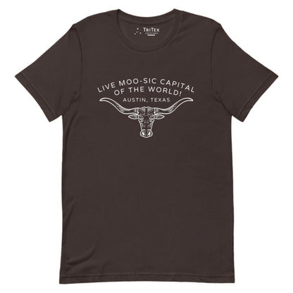 A brown t-shirt featuring an image of a longhorn bull with the words "Live moo-sic capital of the world! Austin, Texas".