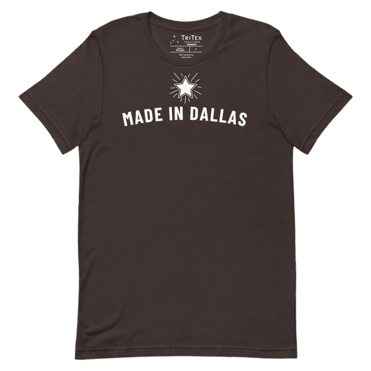 A brown t-shirt with a 5-pointed star and the text "Made in Dallas".