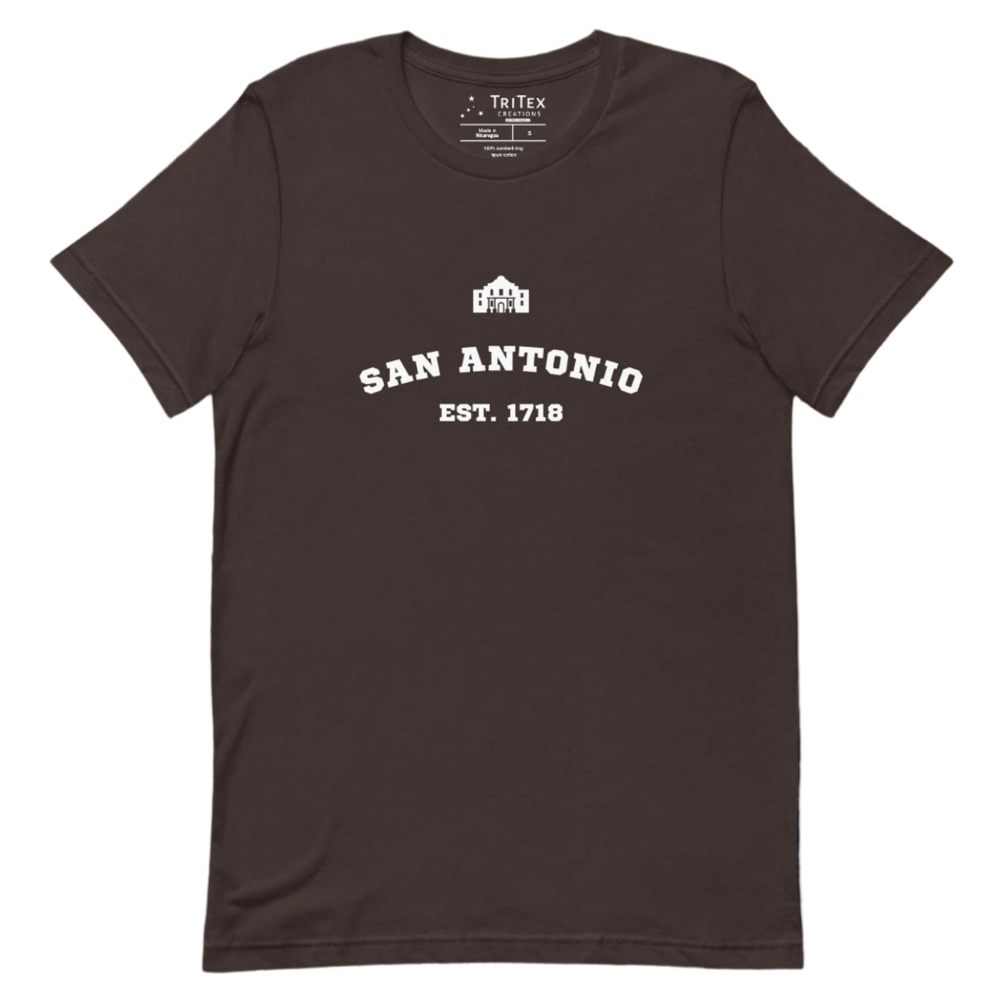 A brown t-shirt featuring a silhouette of The Alamo and the text "San Antonio Est. 1718".