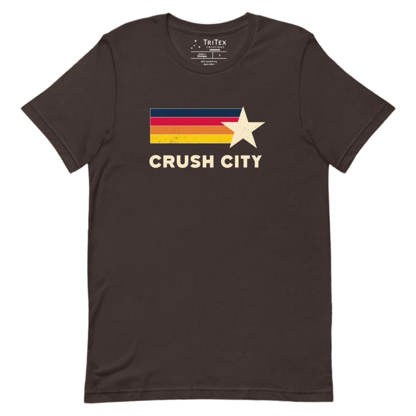 A brown t-shirt featuring blue, red, orange, yellow stripes and a cream-colored star with the words "Crush city".