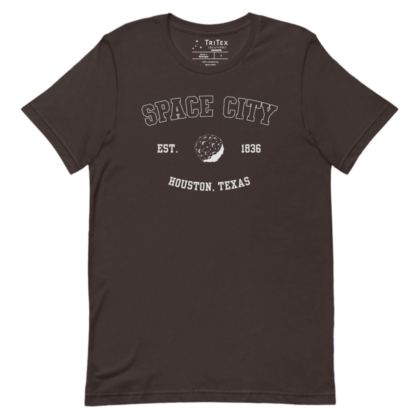 A brown t-shirt featuring a graphic image of the moon with the text "Space City Est. 1836 Houston, Texas".