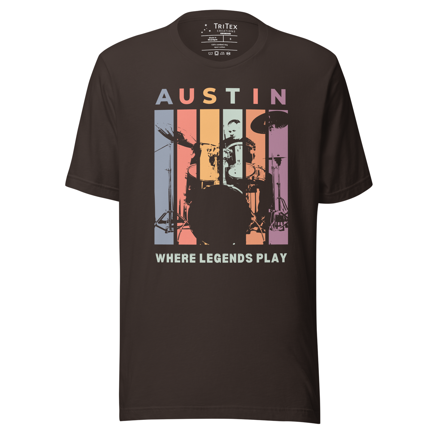A brown t-shirt featuring a silhouette of a drummer with the words "Austin. Where legends play".