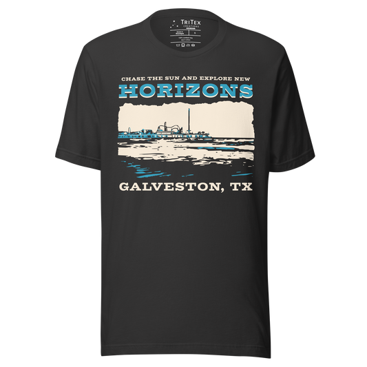 A dark gray t-shirt featuring Pleasure Pier and the shoreline with the words "Chase the sun and explore new horizons Galveston, TX".