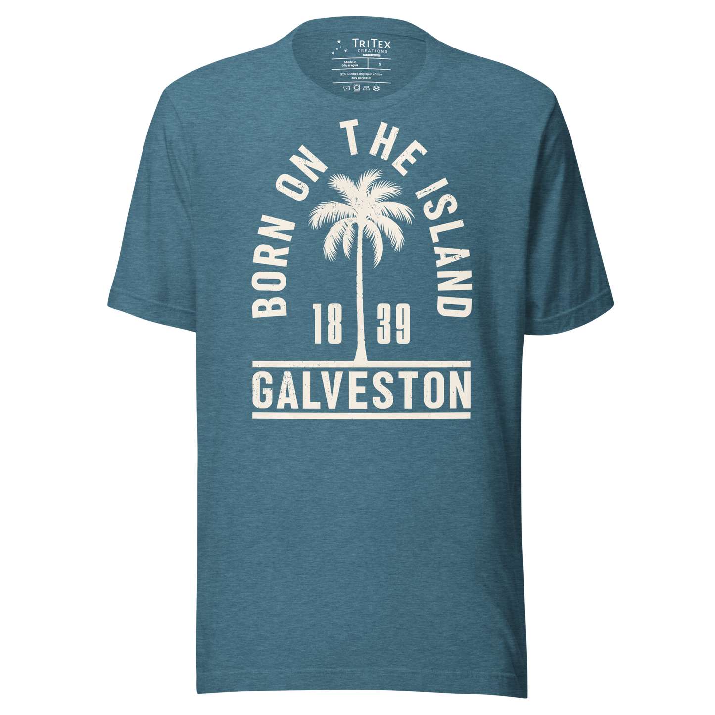 A heather deep teal t-shirt featuring a palm tree with the words "Born on the island. Galveston 1839" with a silhouette of a palm tree.