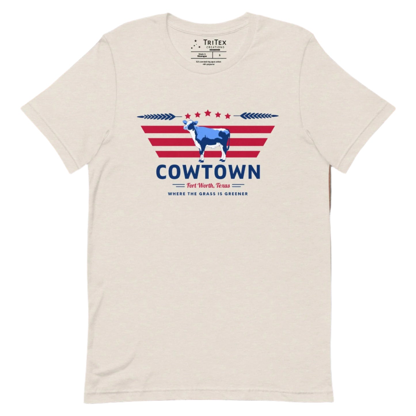 A heather dust t-shirt featuring a cow graphic and the text "Cowtown Fort Worth, Texas. Where the grass is greener".