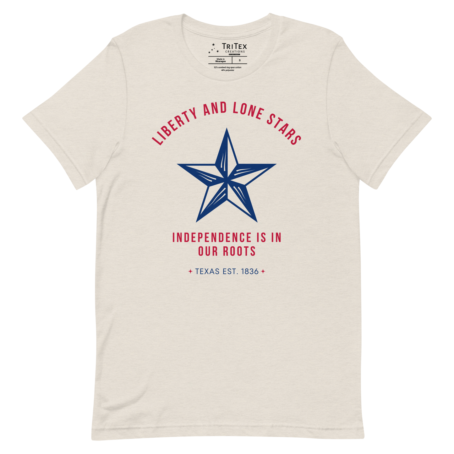 A heather dust shirt featuring a 5-pointed star with the words "Liberty and lone stars. Independence is in our roots. Texas Est. 1836".