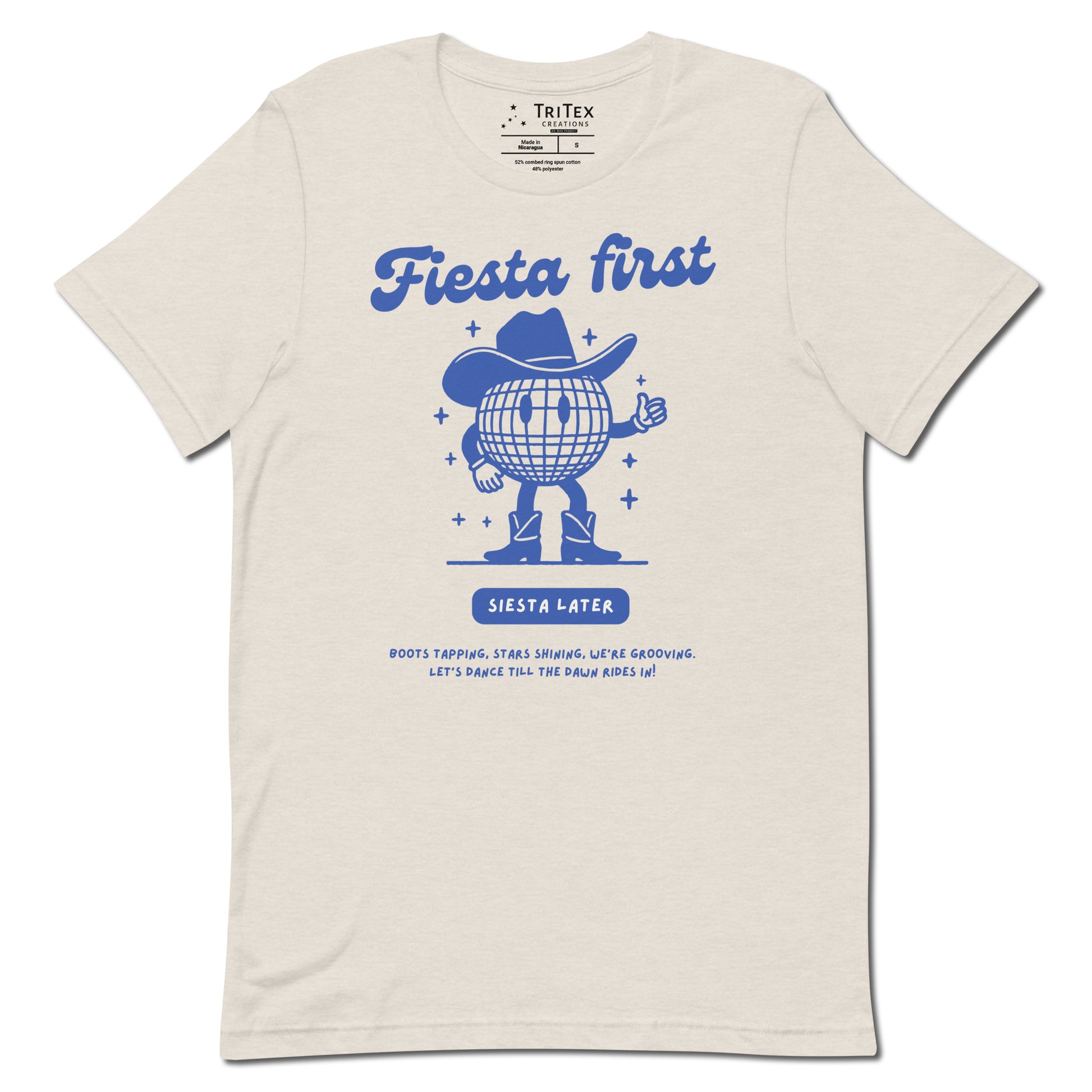 A heather dust t-shirt featuring a cartoon disco ball with arms, legs and a cowboy hat with text that reads: "Fiesta First, Siesta Later. Boots tapping, stars shining, we're grooving. Let's dance till the dawn rides in!".