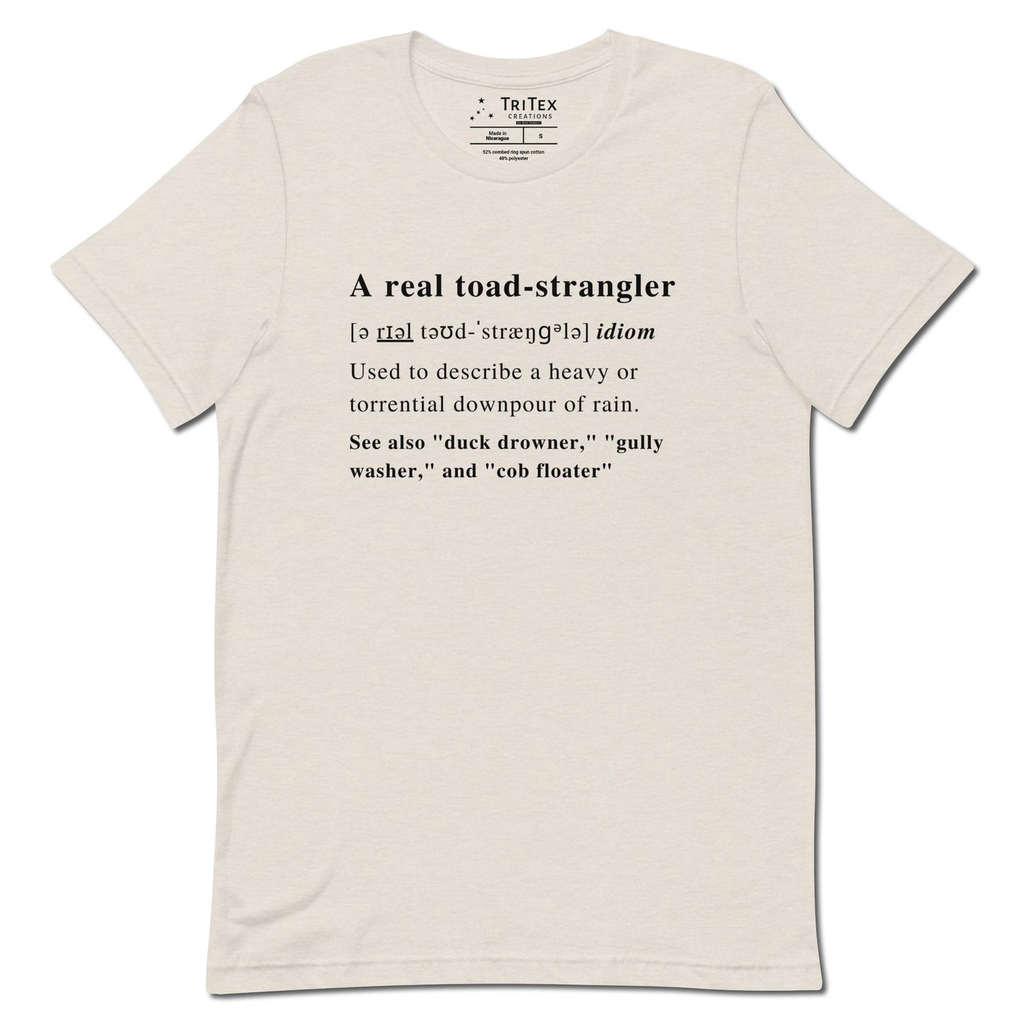 A heather dust t-shirt that describes the meaning of "A real toad-strangler" in the style of a dictionary entry.