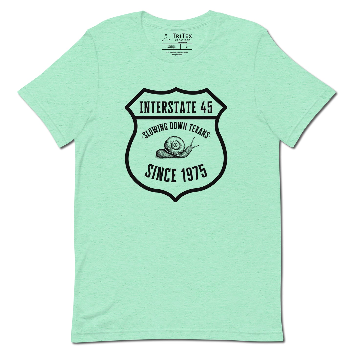 A heather mint t-shirt featuring a vintage illustration of a snail with the text "Interstate 45 slowing down Texans since 1975".