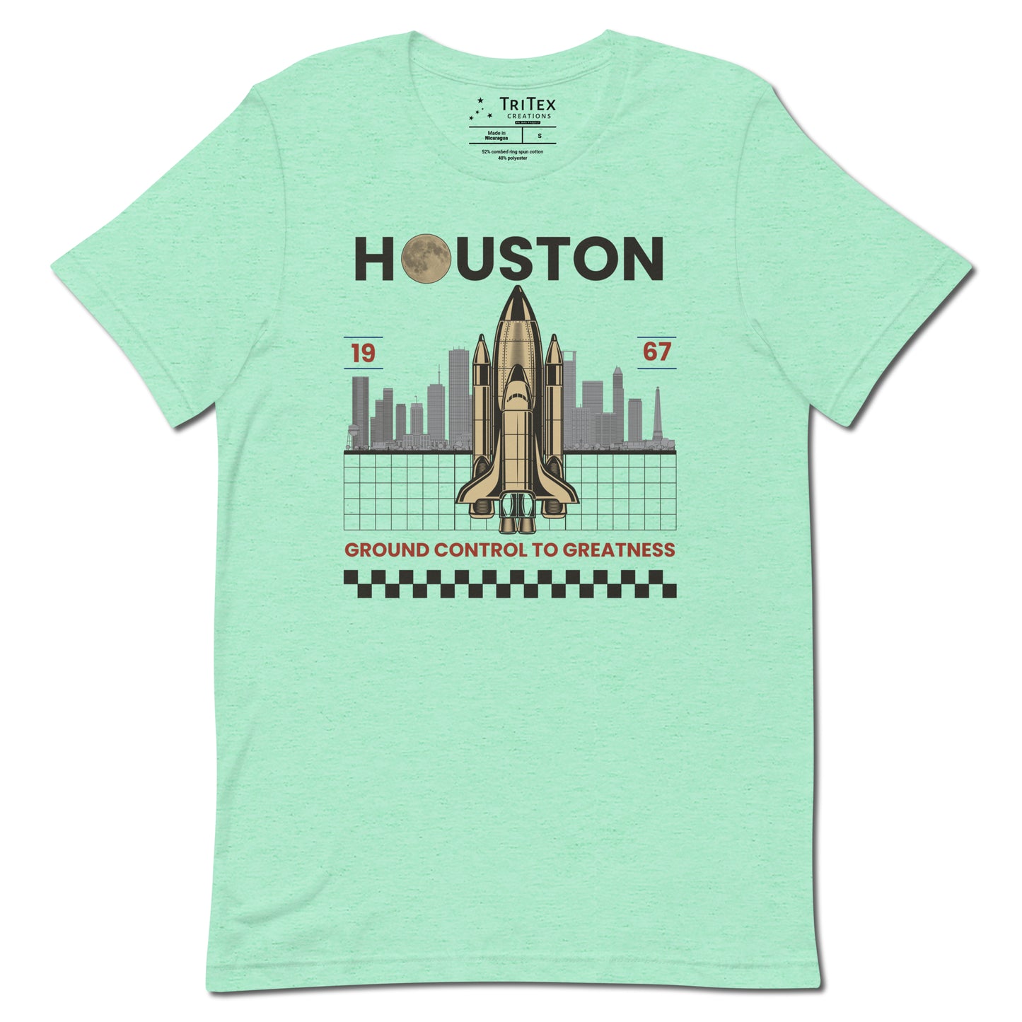 A heather mint t-shirt featuring a space shuttle in front of the Houston skyline and the text "Houston 1967 Ground control to greatness".