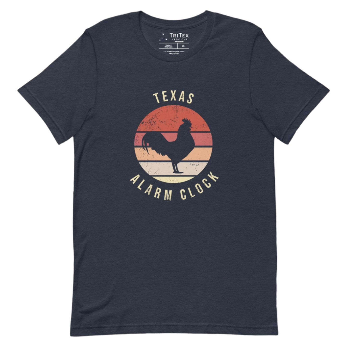 A heather navy t-shirt featuring the silhouette of a rooster with the words "Texas Alarm Clock".