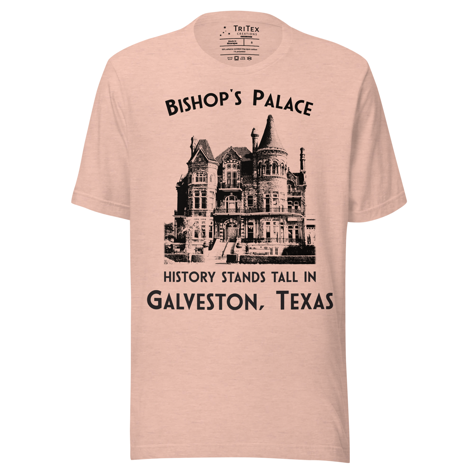 A heather prism peach t-shirt featuring a vintage-style picture of Bishop's Palace with the text "Bishop's Palace. History stands tall in Galveston, Texas".
