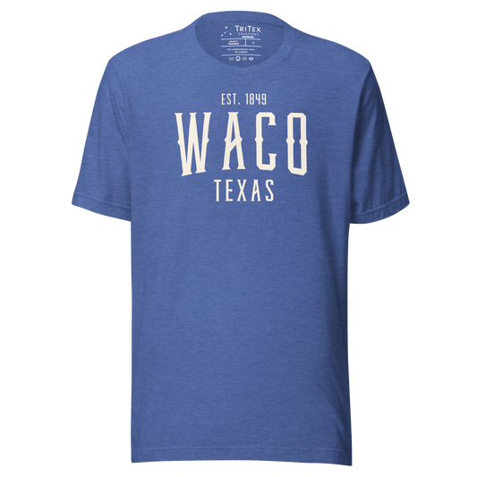 A heather true royal blue t-shirt with the words "Waco Texas Est. 1849".