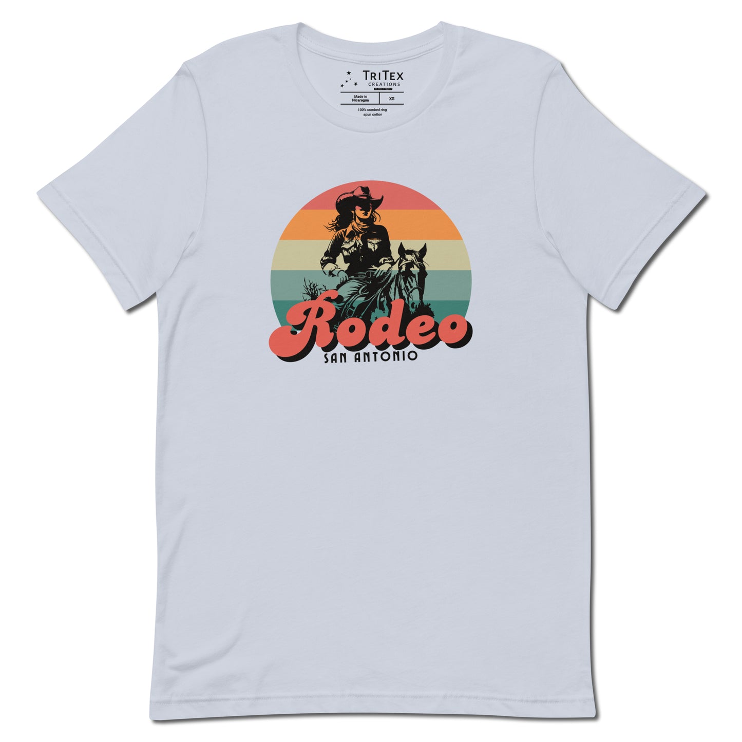 An light blue t-shirt with an illustration of a cowgirl and the text "Rodeo San Antonio".