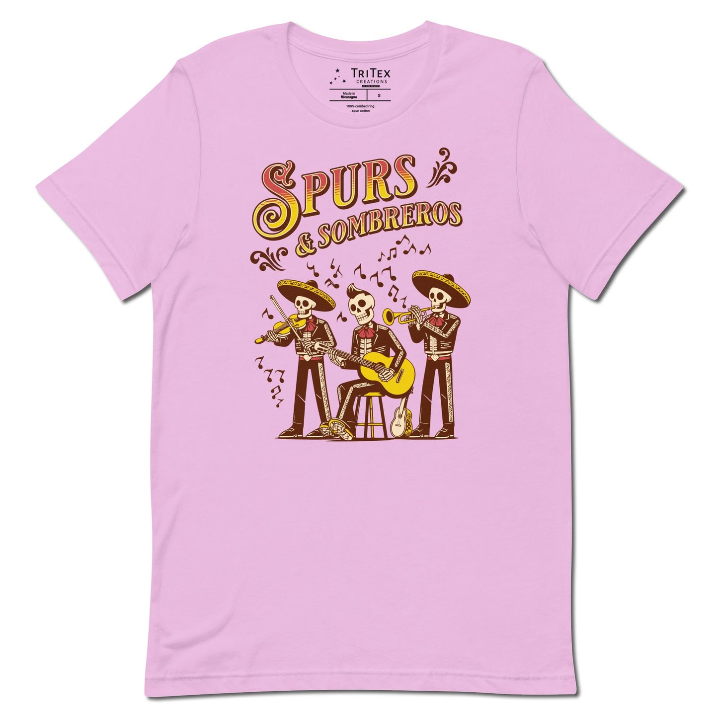 A lilac t-shirt featuring some skeleton mariachis playing music with the words "Spurs & Sombreros".