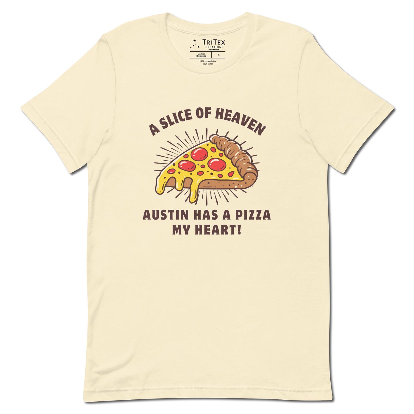 A natural-colored t-shirt featuring an image of a slice of pizza with the words" A slice of heaven Austin has a pizza my heart!".