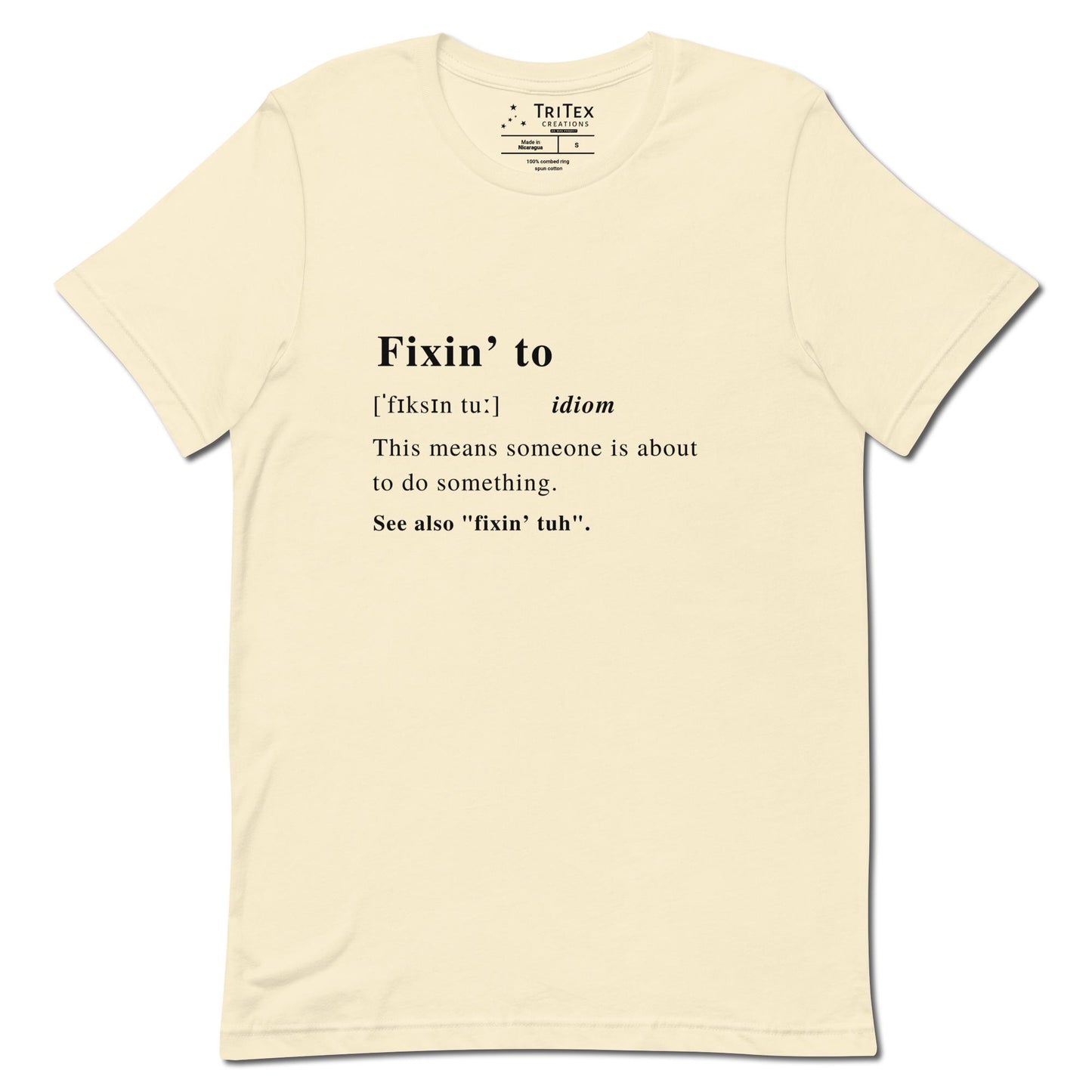 A natural-colored t-shirt with the definition of "Fixin' to" styled like a dictionary entry