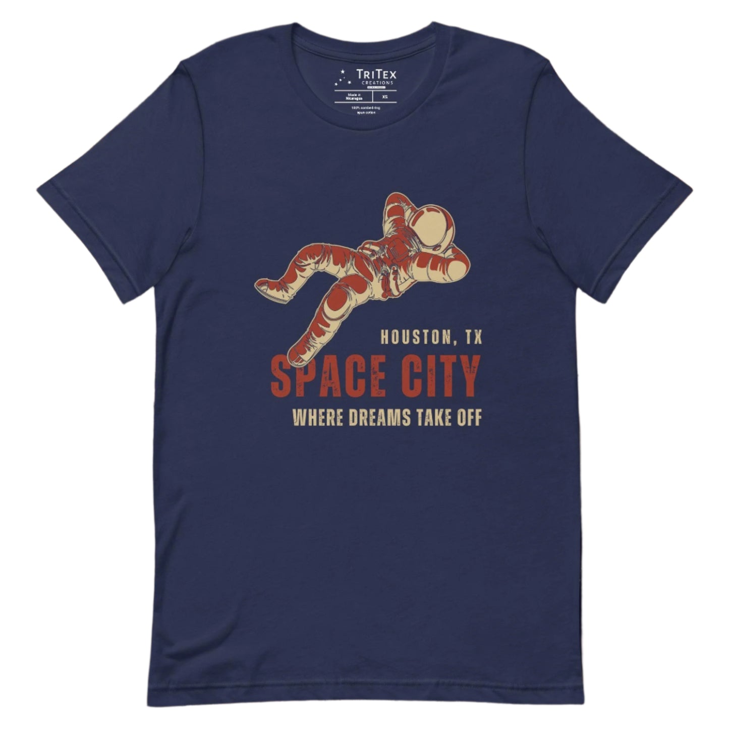 A navy t-shirt featuring a dreaming astronaut with the words "Houston, TX. Space city. Where dreams come true".