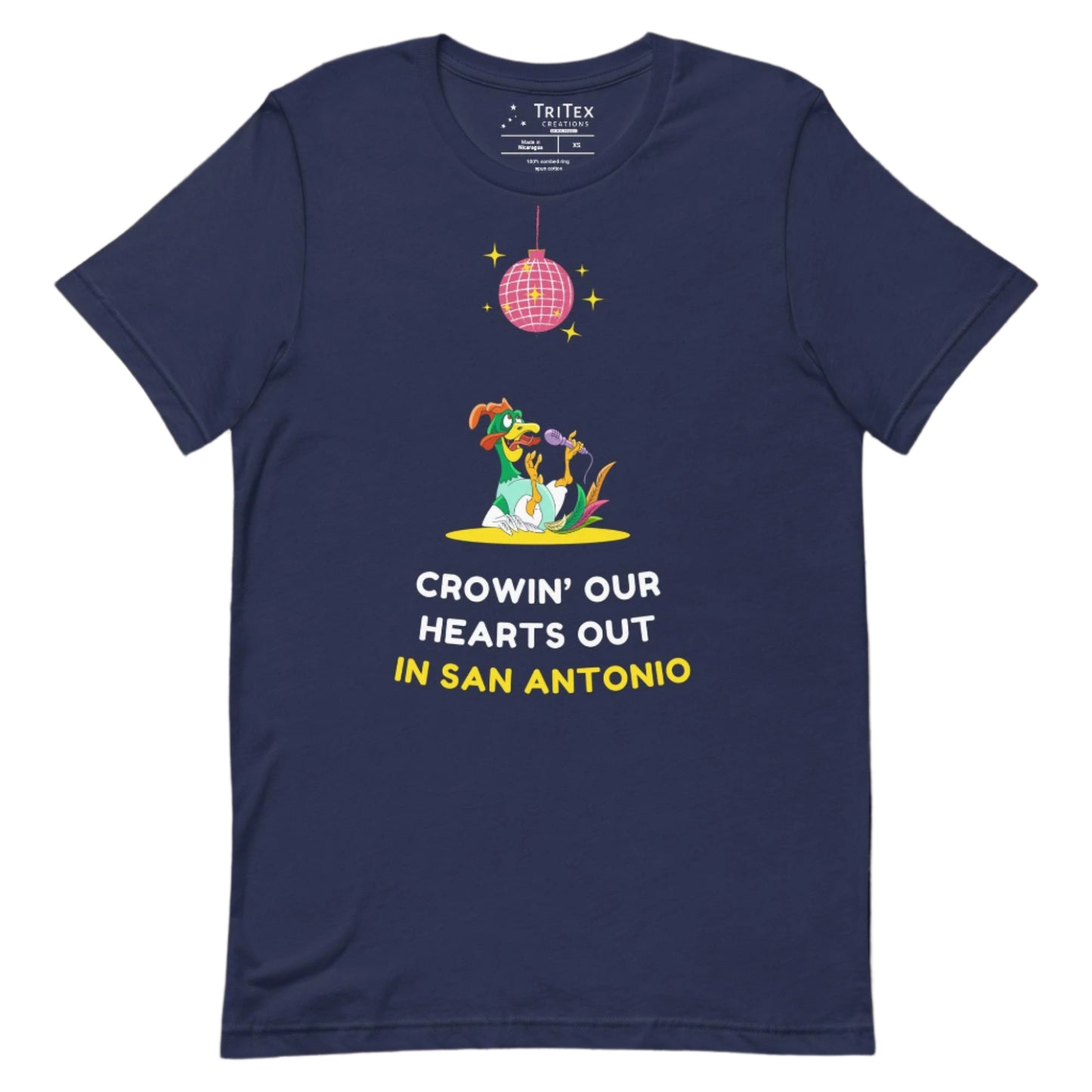 A navy t-shirt featuring a rooster singing it's lungs out under a disco ball above the words "Crowin' our hearts out in San Antonio".