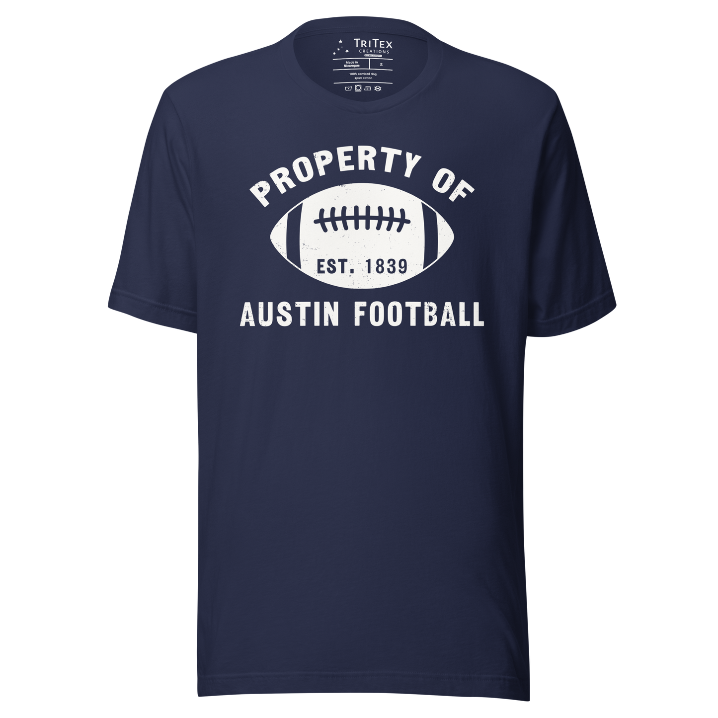 A navy blue t-shirt featuring a silhouette of a football with the words "Property of Austin football. Est. 1839".