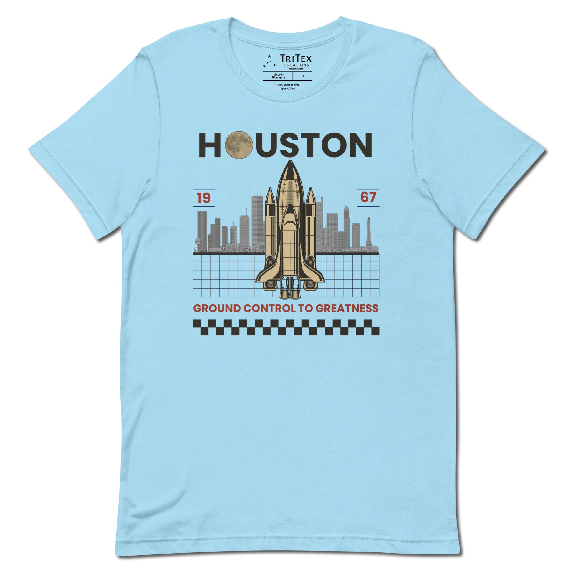 A ocean blue t-shirt featuring a space shuttle in front of the Houston skyline and the text "Houston 1967 Ground control to greatness".