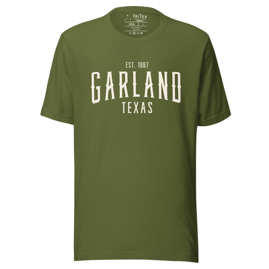 An olive green t-shirt with the words "Garland Texas Est. 1887".
