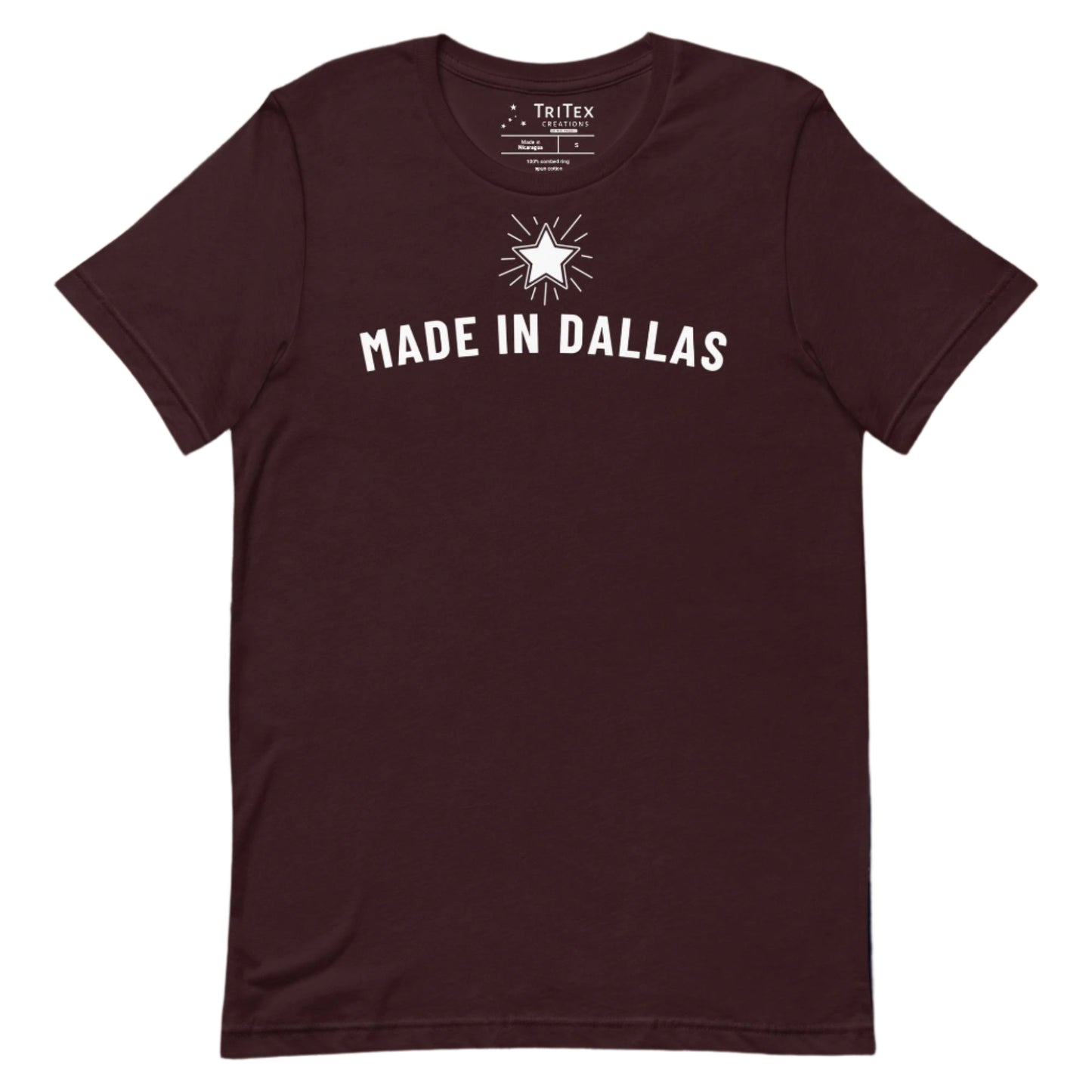 An oxblood black t-shirt with a 5-pointed star and the text "Made in Dallas".