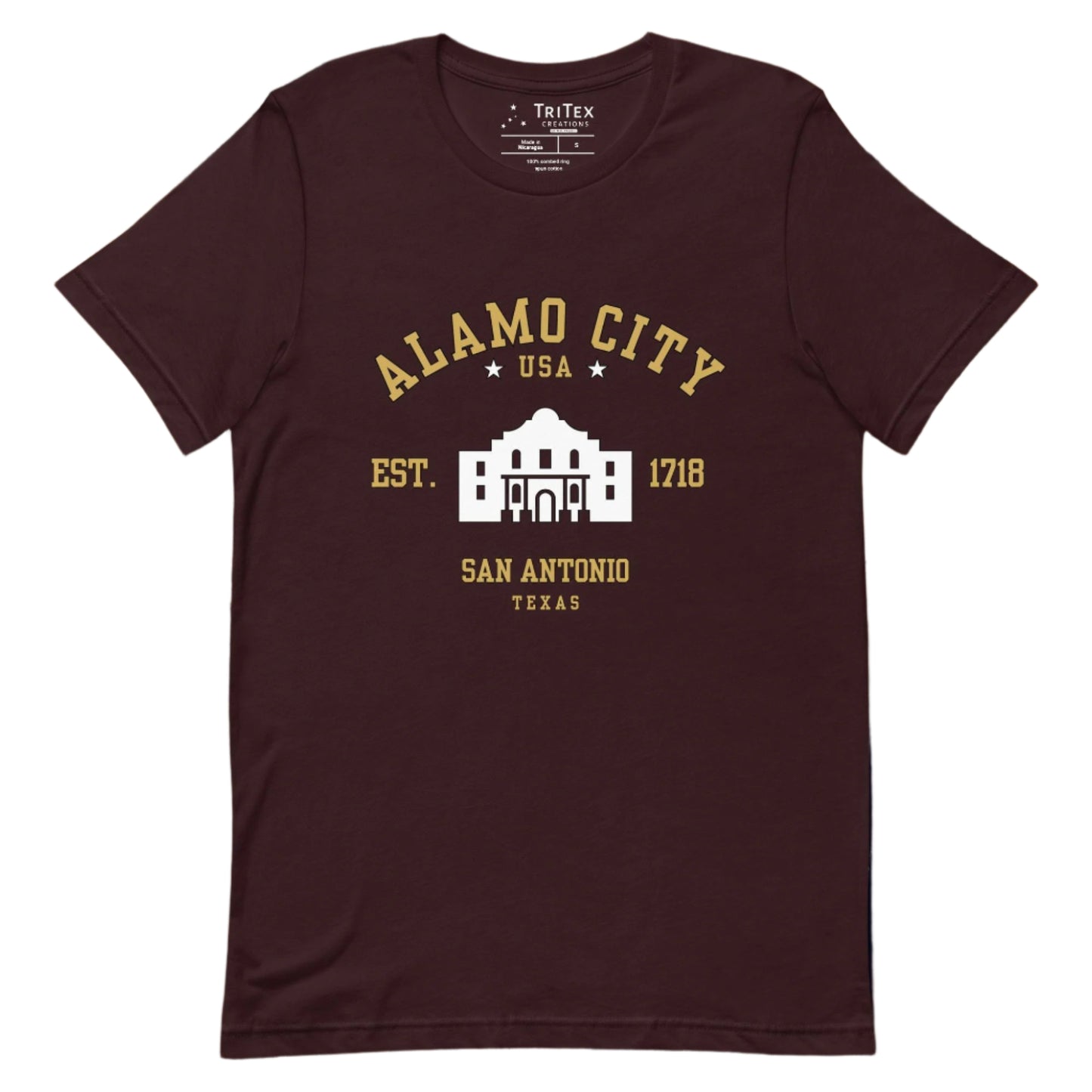 An oxblood black t-shirt featuring an image of The Alamo with the words "Alamo City USA Est. 1718 San Antonio Texas".