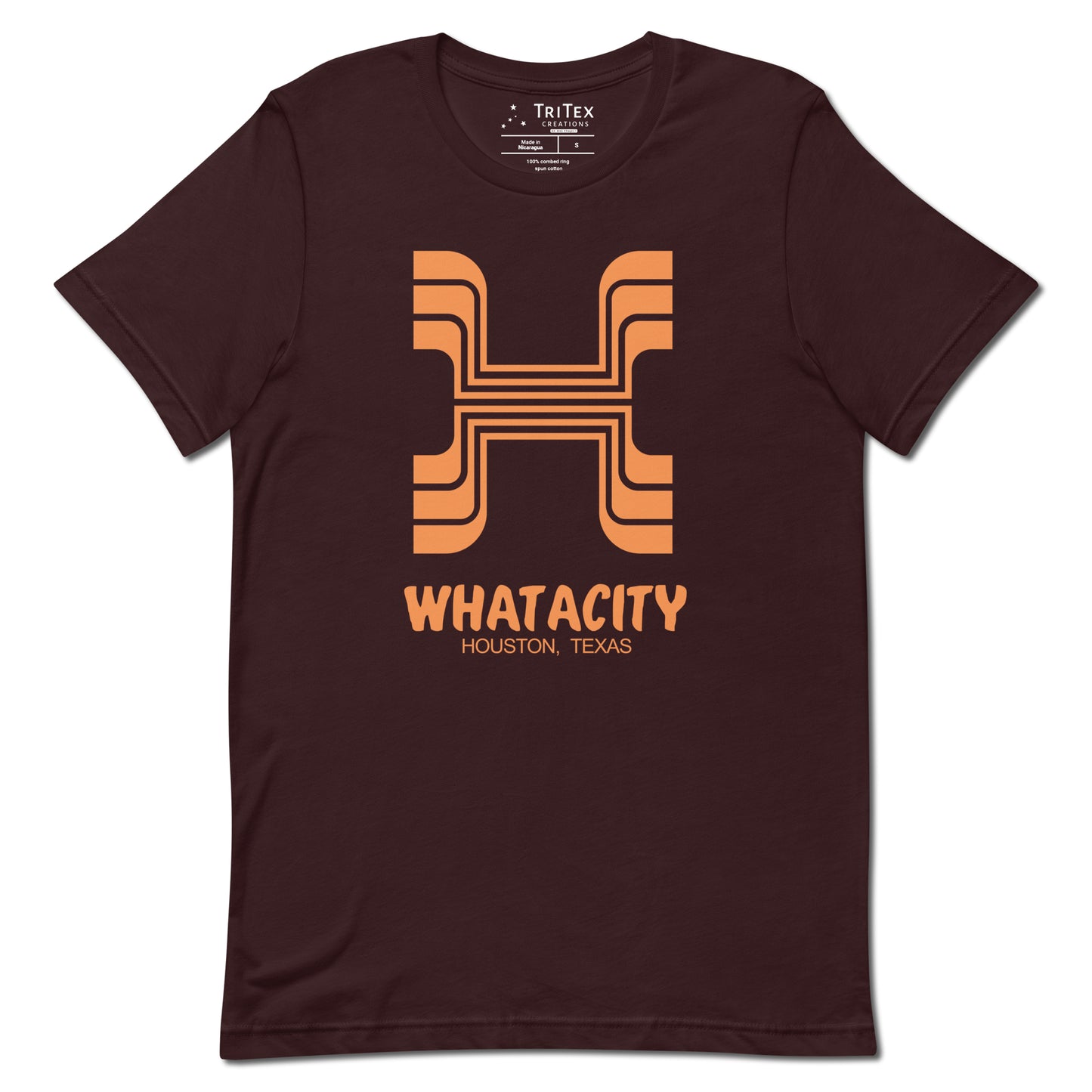 An oxblood black t-shirt featuring a letter H style like the Whataburger logo with the text "Whatacity Houston, Texas".