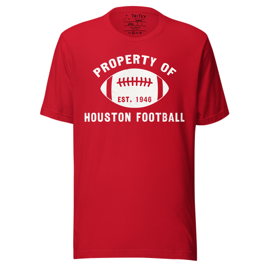 A red t-shirt featuring a silhouette of a football with text that reads "Property of Houston Football Est. 1946".