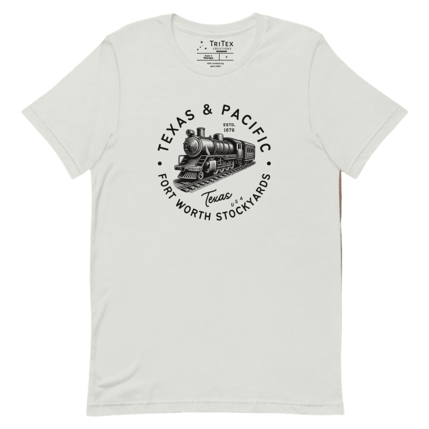 A silver t-shirt featuring a vintage illustration of a locomotive with the words "Texas & Pacific. Fort Worth Stockyards. Texas USA".