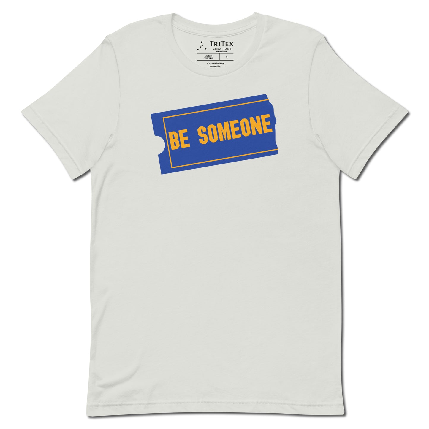 A silver shirt with the words "Be Someone" written in the style of the Blockbuster logo.