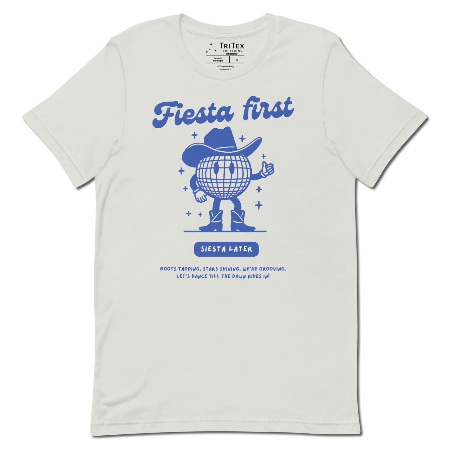 A silver t-shirt featuring a cartoon disco ball with arms, legs and a cowboy hat with text that reads: "Fiesta First, Siesta Later. Boots tapping, stars shining, we're grooving. Let's dance till the dawn rides in!".