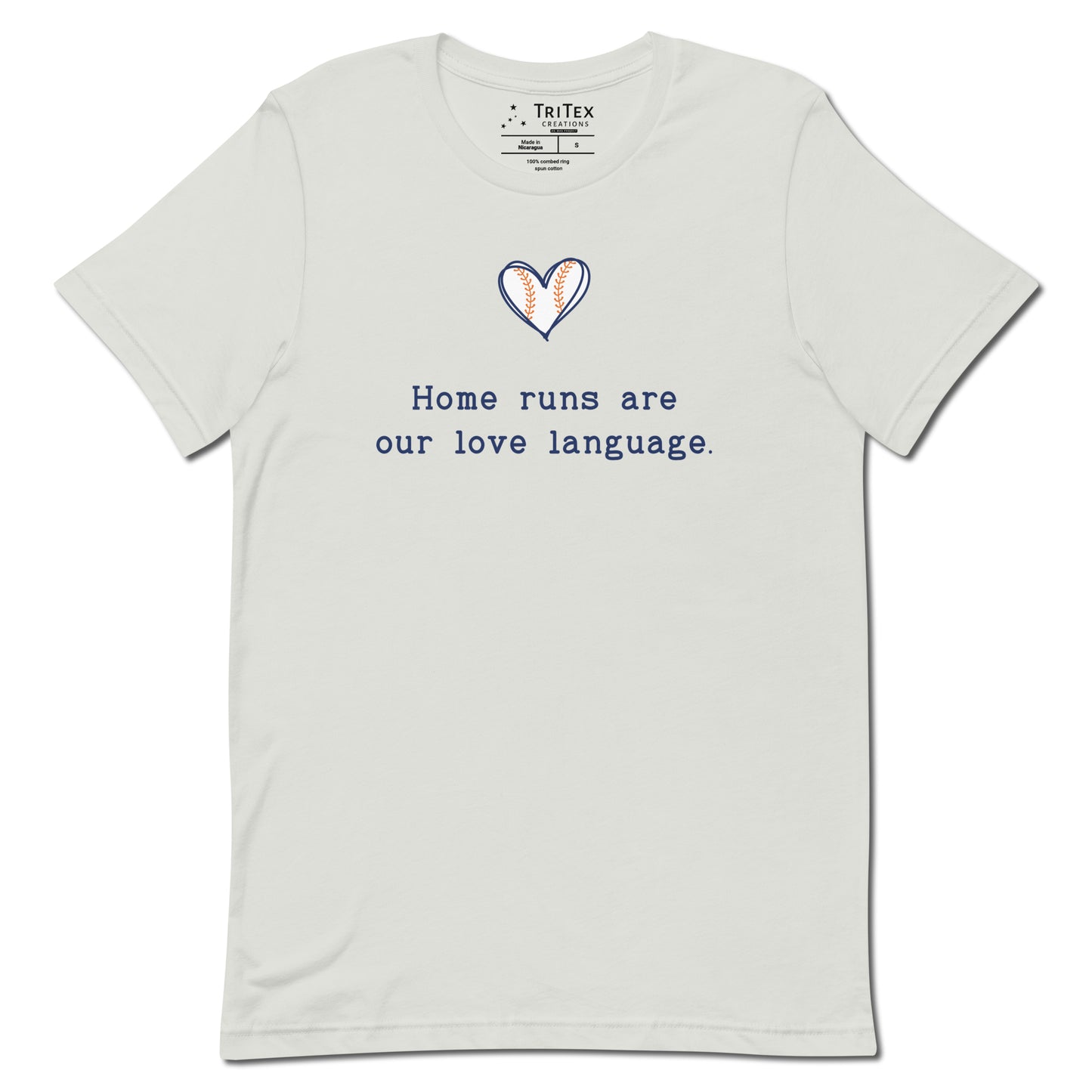 A silver t-shirt picturing a heart-shaped baseball with the text "Home runs are our love language".