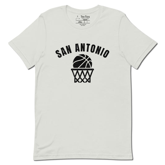 A silver t-shirt featuring a basketball and net with the words "San Antonio".