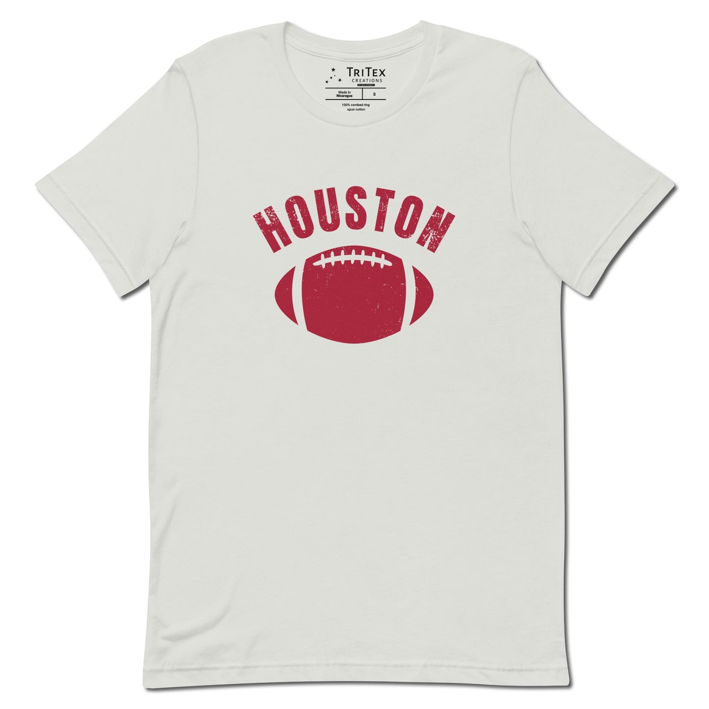 A silver t-shirt featuring the silhouette of a football and the words "Houston".