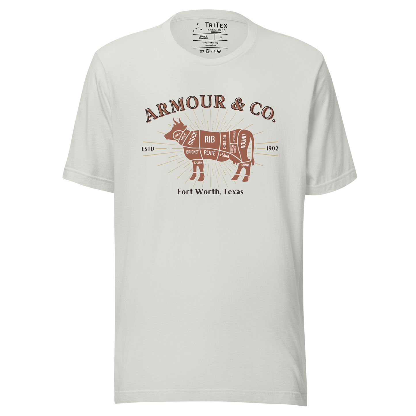 A silver t-shirt featuring a silhouette of a cow with the different cuts of meat and the text "Armour & Co. Estd 1902 Fort Worth, Texas".