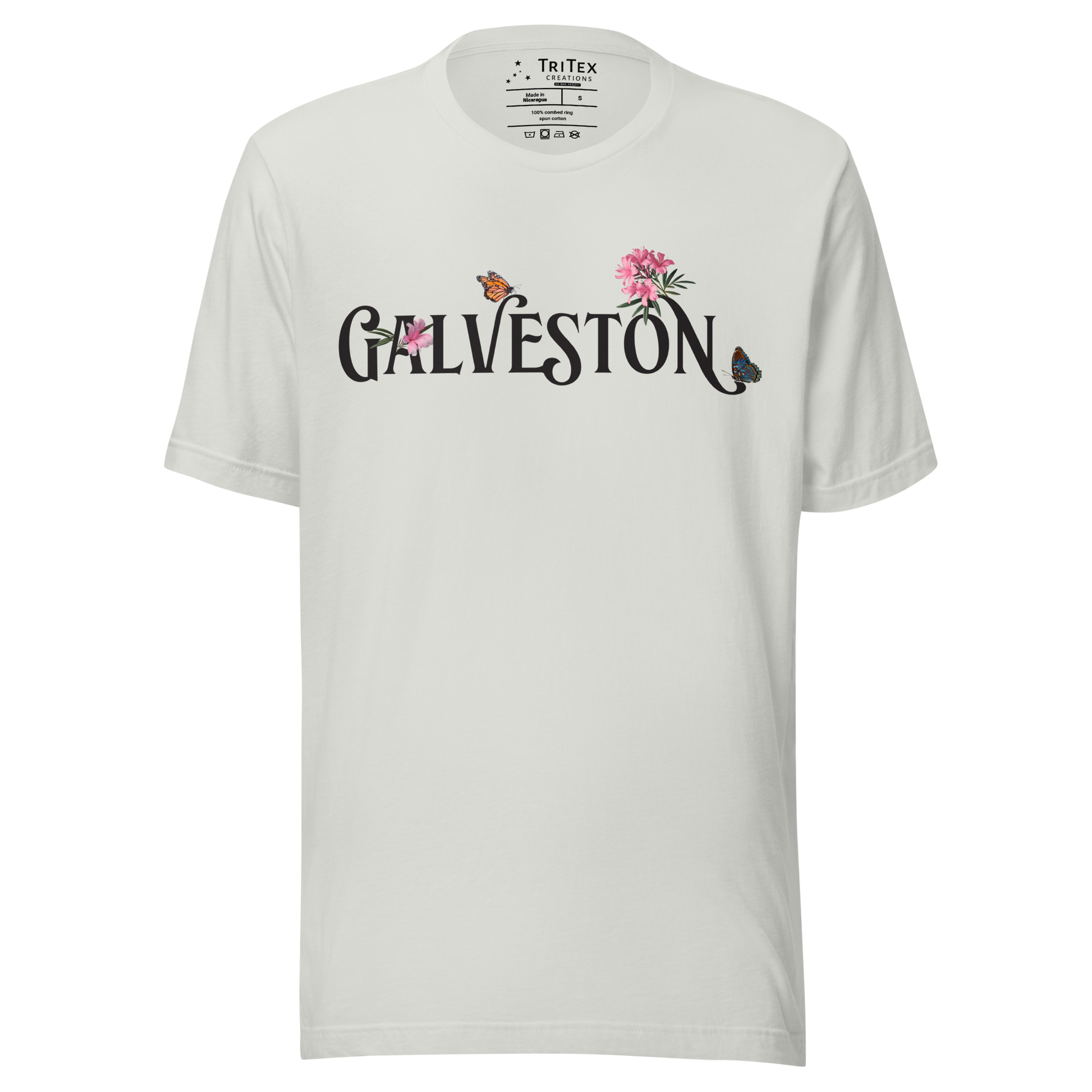 A silver t-shirt with the name of "Galveston" amongst oleanders and butterflies.