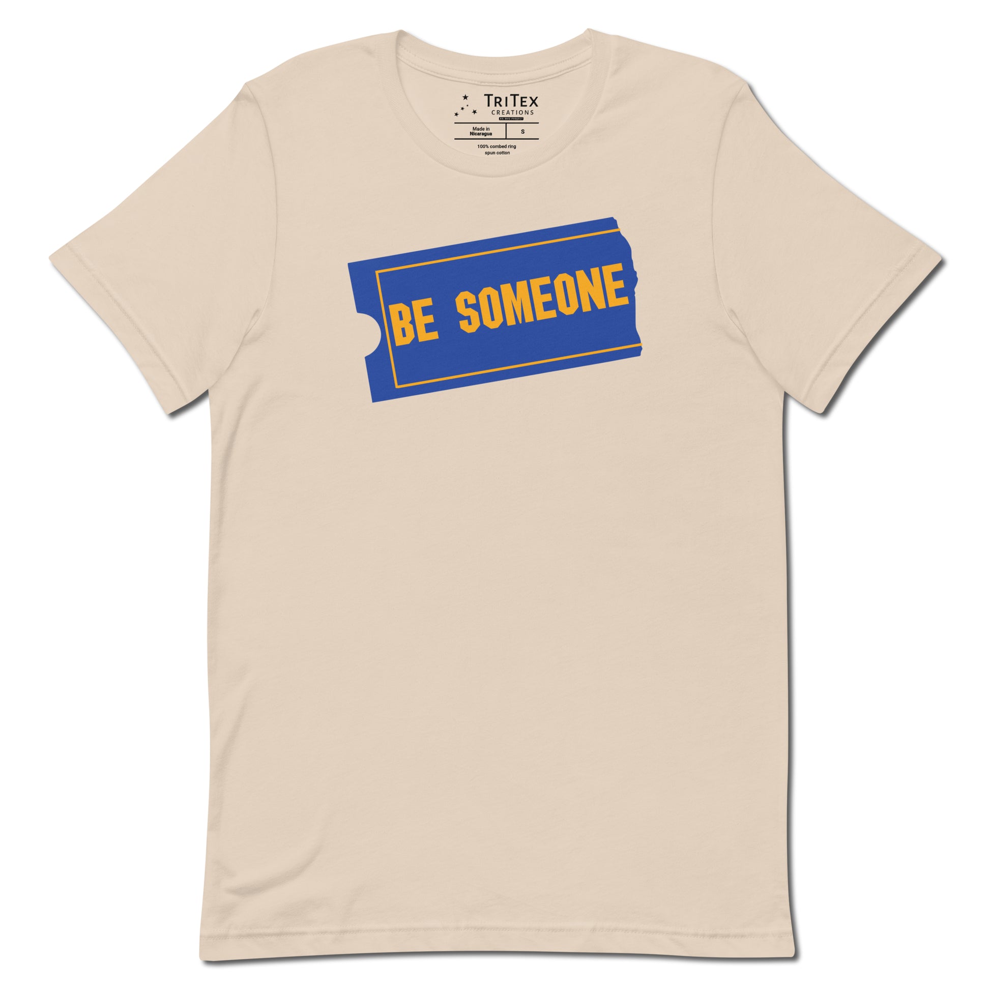 A soft cream shirt with the words "Be Someone" written in the style of the Blockbuster logo.