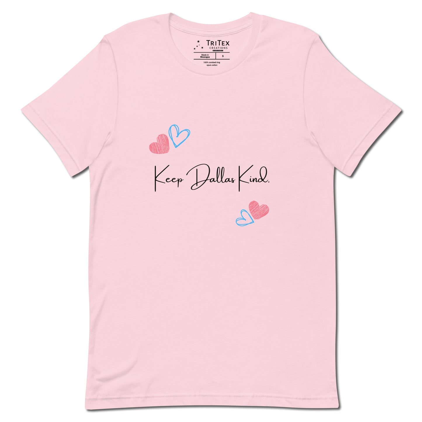 A soft pink t-shirt with hearts and the text "Keep Dallas Kind".