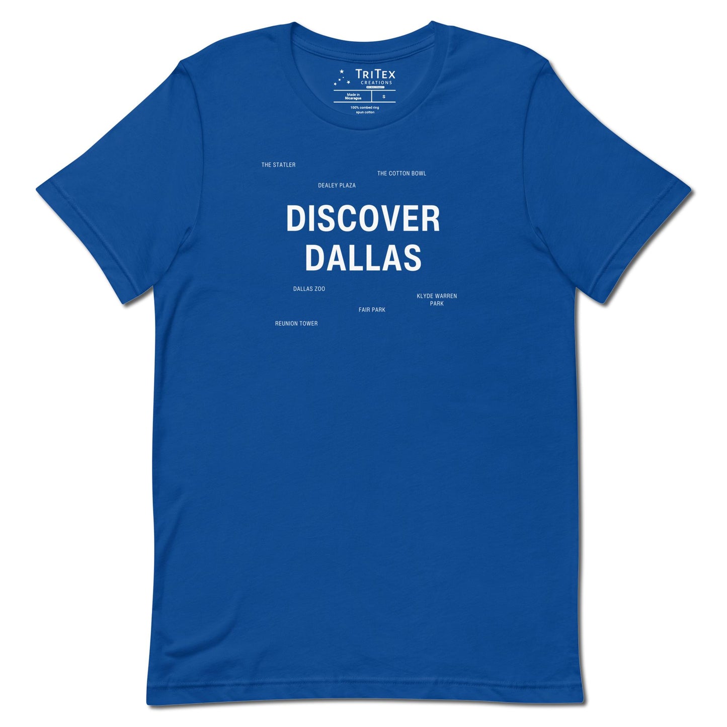 A true royal t-shirt which reads "Discover Dallas" in big, bold text with smaller text elements naming Dallas landmarks.