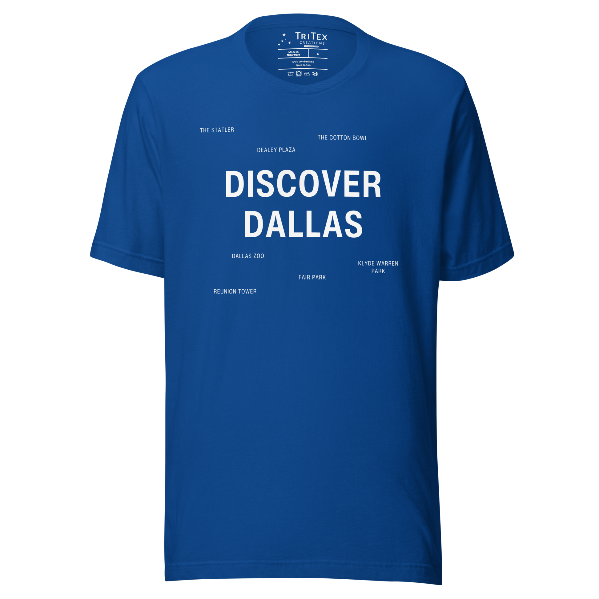A true royal blue t-shirt featuring "Discover Dallas" in big, bold type surrounded by smaller names of local landmarks.