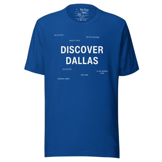 A true royal blue t-shirt featuring "Discover Dallas" in big, bold type surrounded by smaller names of local landmarks.