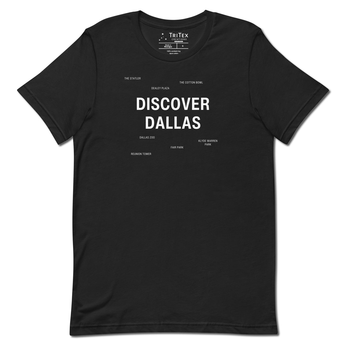 A vintage black t-shirt which reads "Discover Dallas" in big, bold text with smaller text elements naming Dallas landmarks.