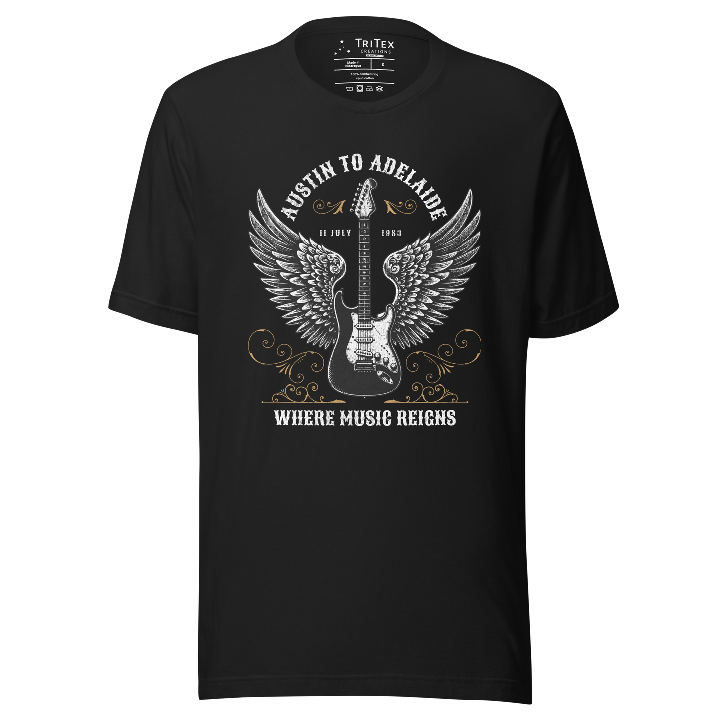 A vintage black t-shirt featuring an electric guitar with wings and the words "Austin to Adelaide 11 July 1983. Where music reigns".